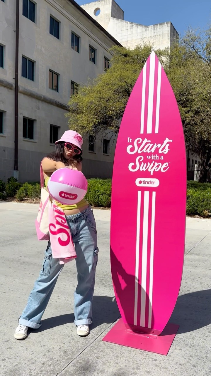 Instagram post by an influencer for Tinder. Caption reads: Day in my life at UT Austin! @tinder....