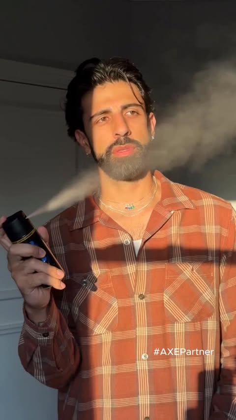 Instagram post by @shanmolu for AXE. Caption reads: Buy AXE’s NEW Midnight Amber body spray, now at....