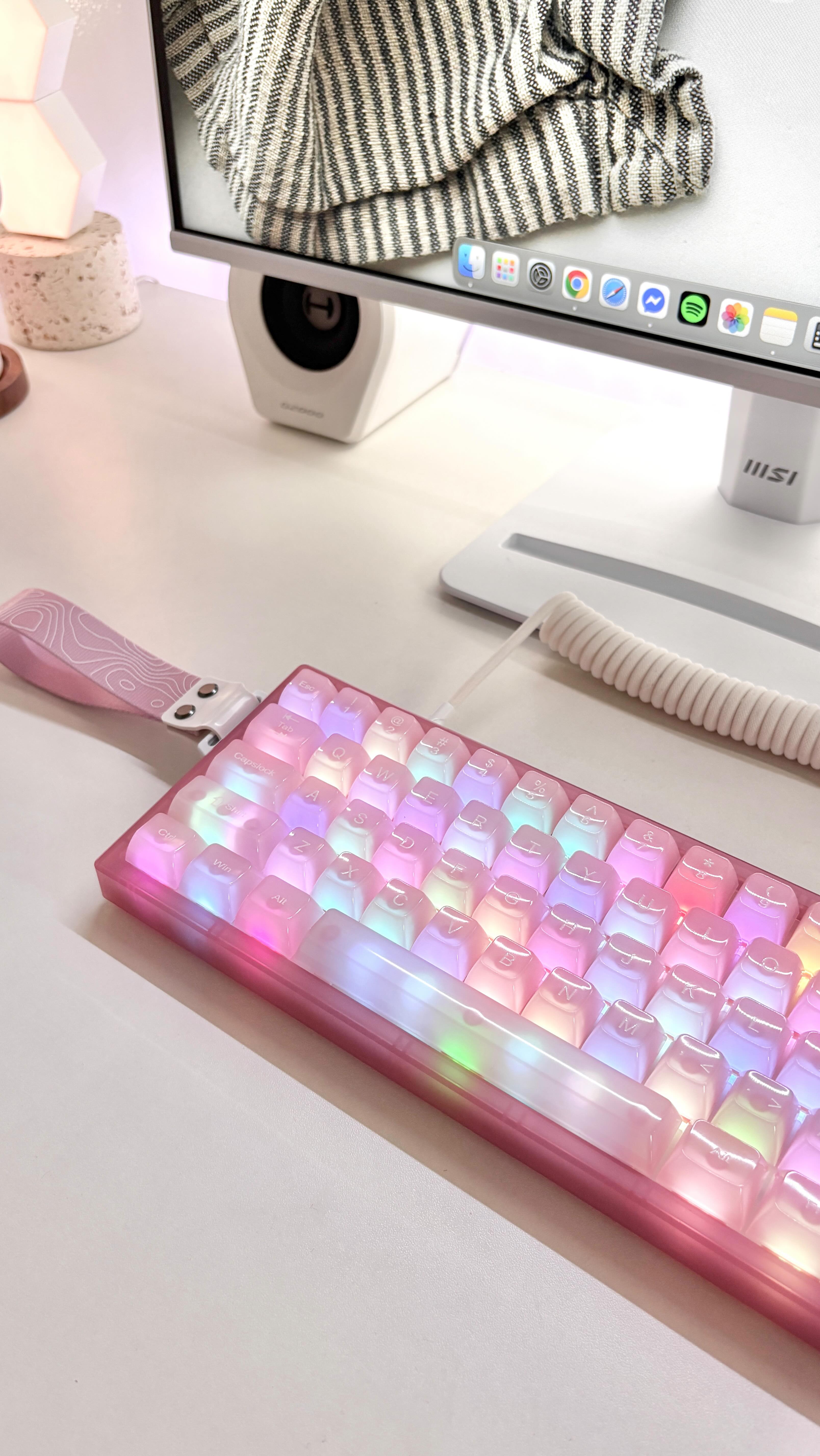 Instagram post by @cristeneanne for Womier Keyboard. Caption reads: OBSESSED with this jello-pink dream! 💖 This is....
