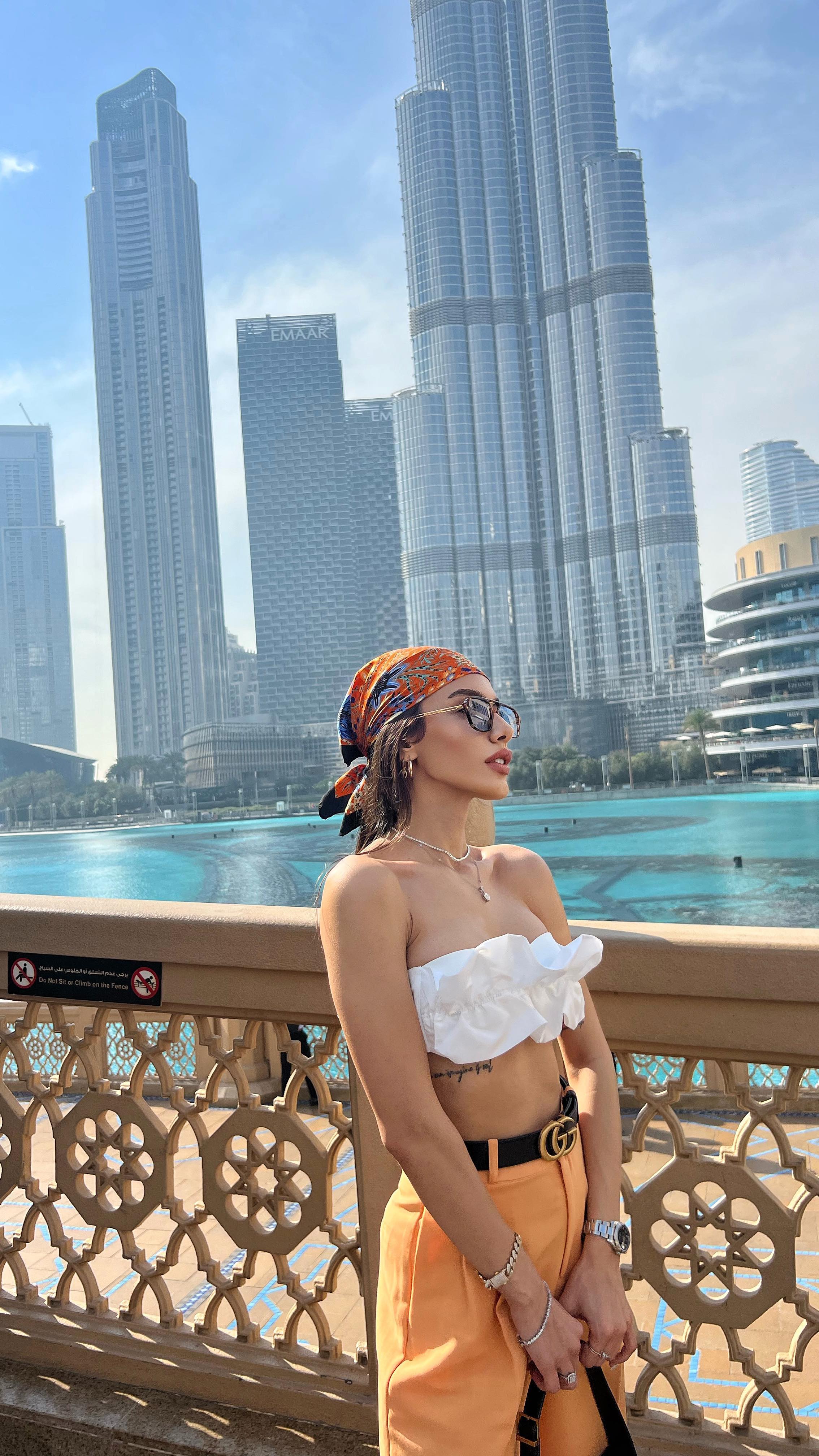 Instagram post by @tgbaozdemrr for Burj Khalifa by Emaar. Caption reads: I feel free and happy❣️.