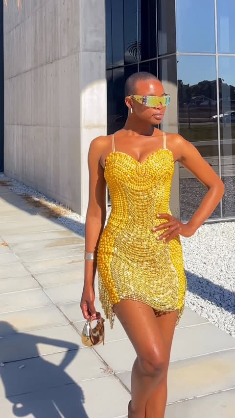 Instagram post by @_noku_m for Mew Mews. Caption reads: [...] Noku M 🤭🧚🏾‍♀️ Dress : @mewmewsofficial....