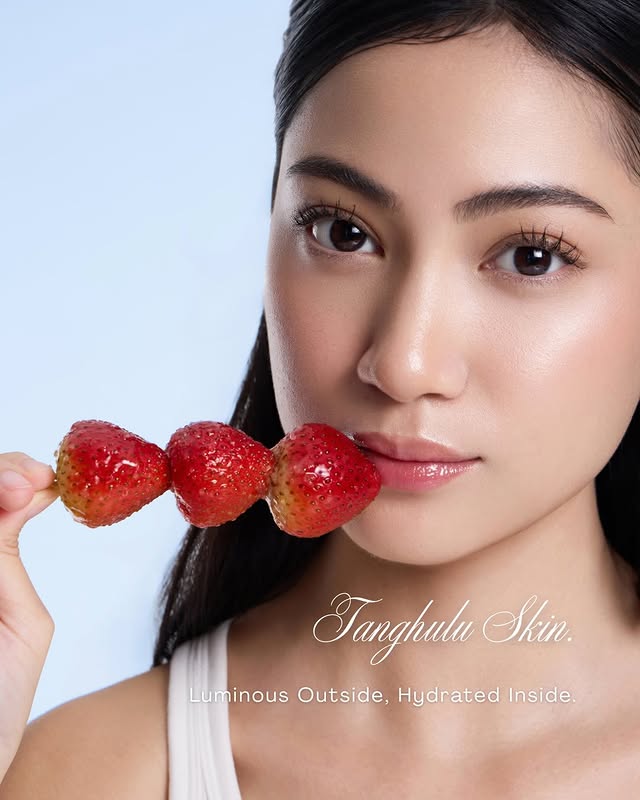 Instagram post by @imanopie for Hada Labo Singapore. Caption reads: my glow = tanghulu approved 🍯🍓🍒....
