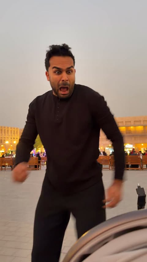 Instagram post by @adamw for Visit Qatar. Caption reads: When u bump into the wrong person @visitqatar....