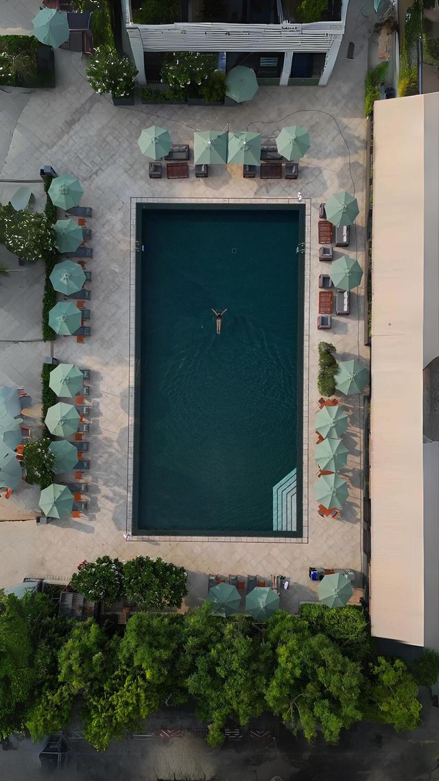 Instagram post by @leeshbrock for Small Luxury Hotels. Caption reads: A moment of calm at @thesukhothaibangkok....