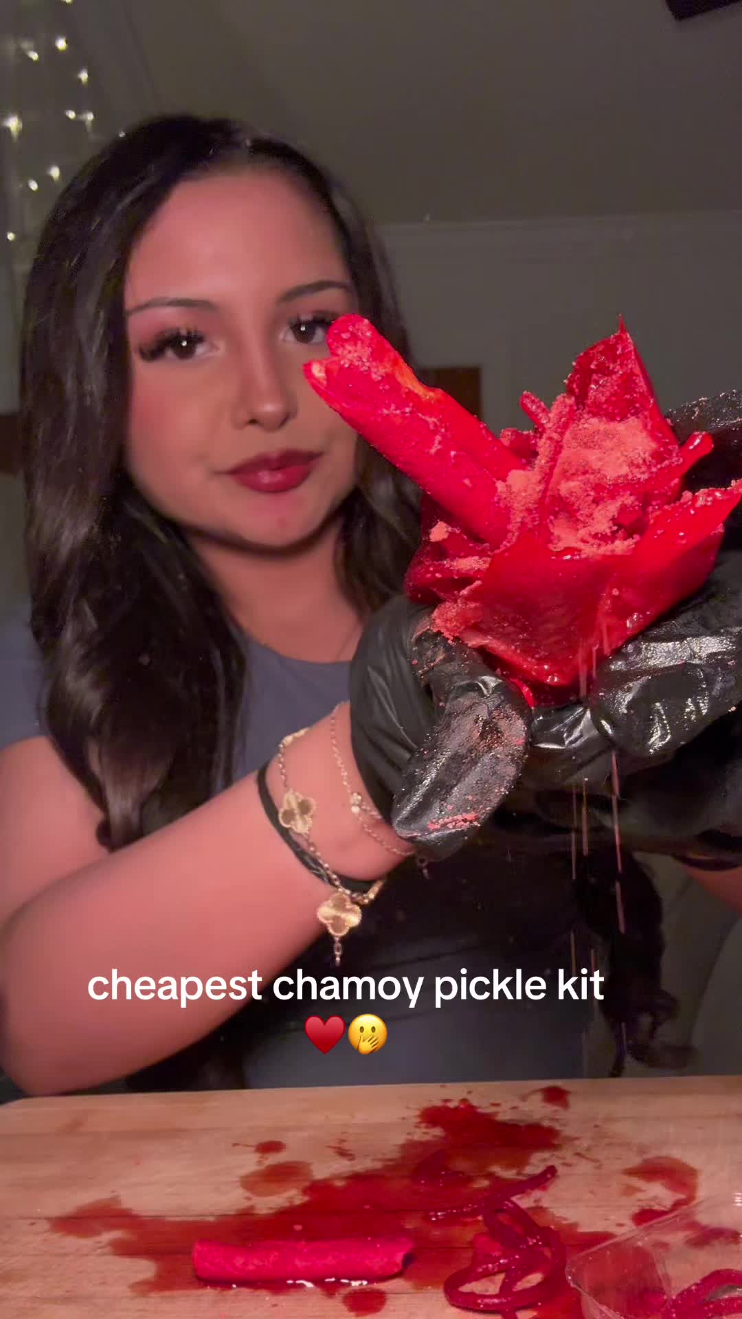 TikTok post by @lilah.eats for Bussin Snacks. Caption reads: can’t get enough of chamoy pickles ♥️ @Bussin....