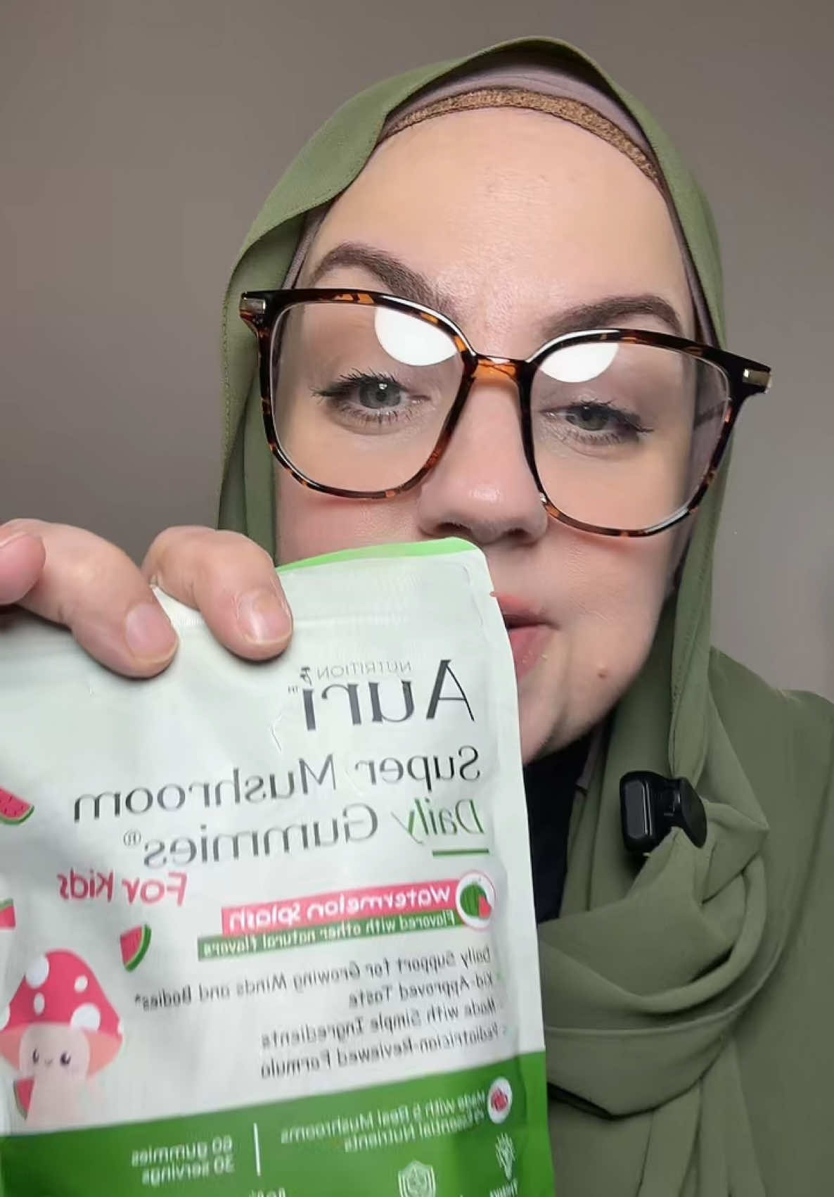 TikTok post by @nooralhayat23 for Auri Nutrition. Caption reads: [...] @Auri Nutrition 🍄.