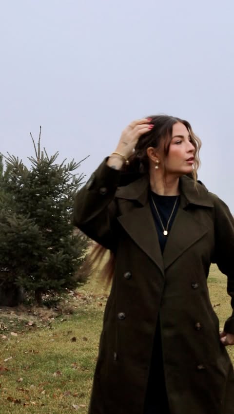 Instagram post by @jessmoskaluke for RW&CO.. Caption reads: absolutely obsessed with this @rw_co trench.....