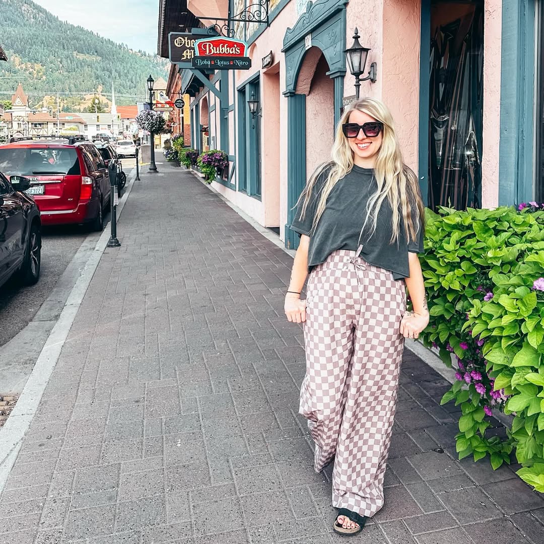 Instagram post by @ashleyjtodd for Albion Fit. Caption reads: [...] these comfy cute checkered pants from....