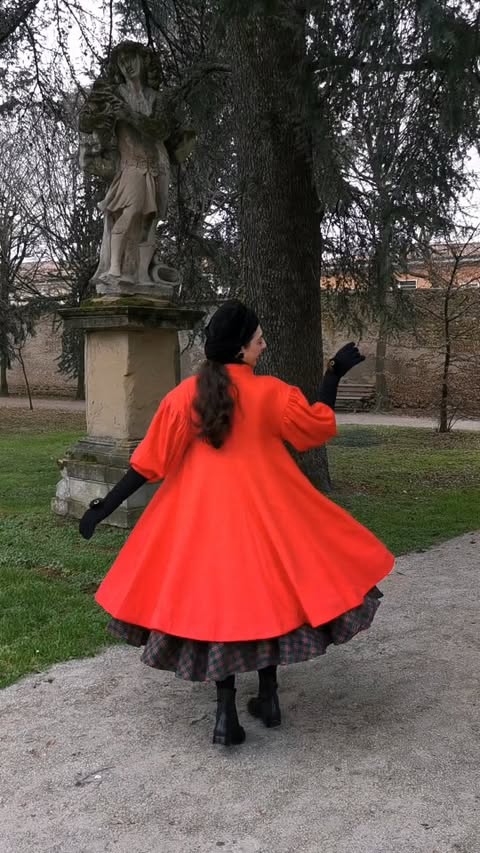 Instagram post by @out_of_time_doll for Unique Vintage. Caption reads: [...] iconic Barbie’s 1962 Red Flare Coat....