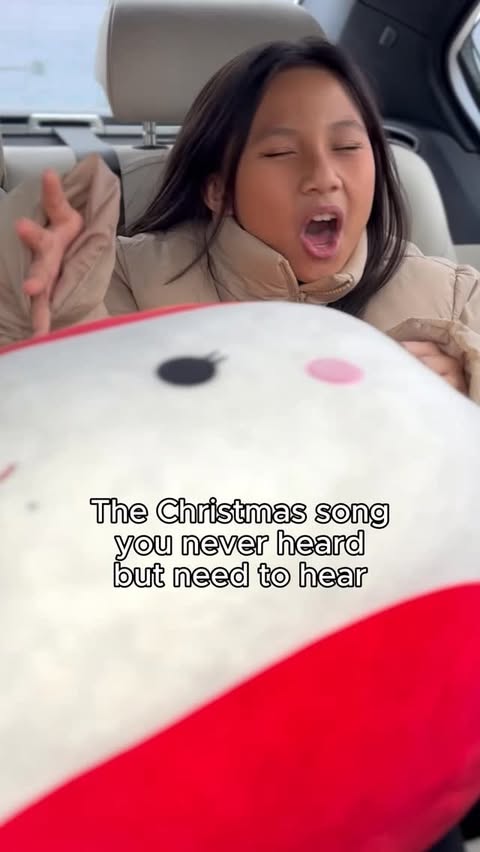 Instagram post by @zoeerianna for Squishmallows. Caption reads: Guaranteed you never heard this Christmas song.....
