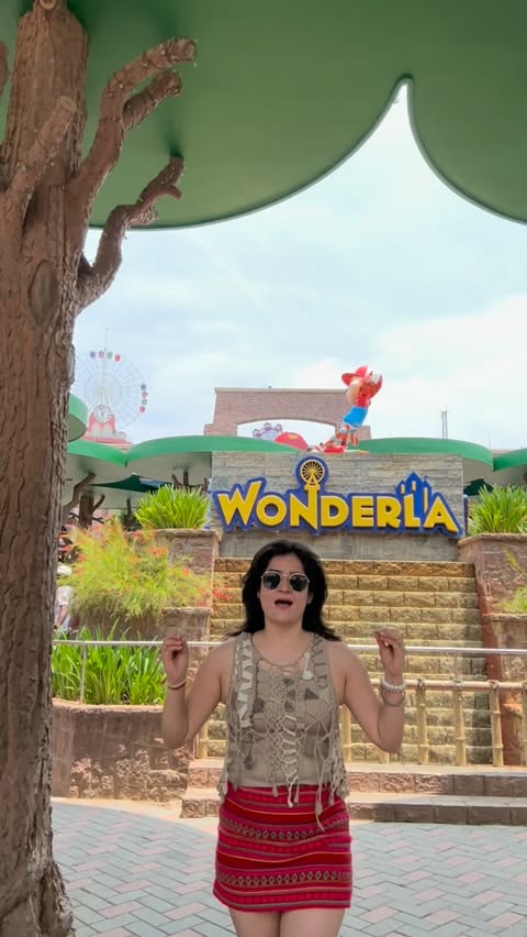 Instagram post by @riyabeni for Wonderla Holidays. Caption reads: The craziest experience this summers at....