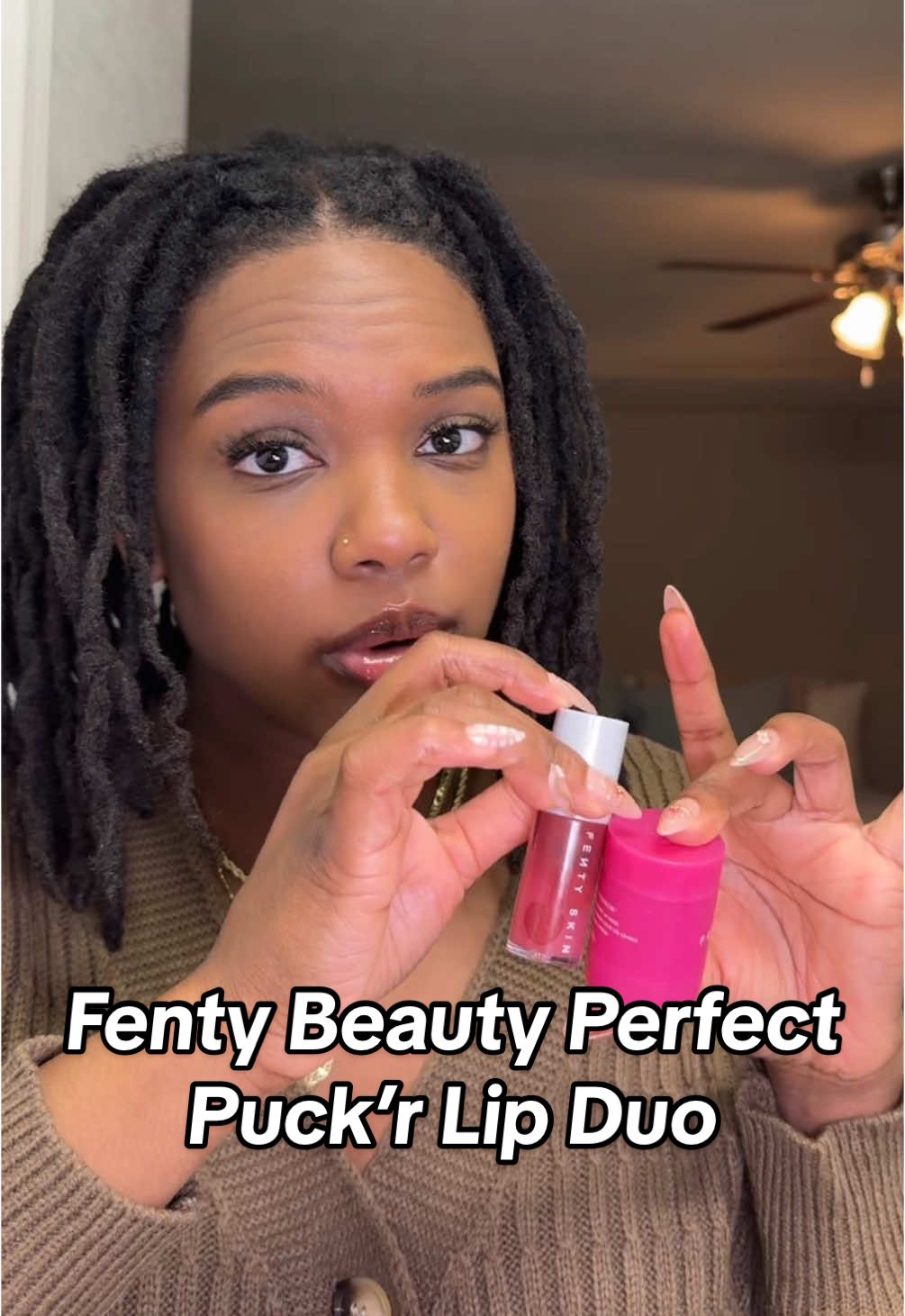 TikTok post by @thecatherinealexandra for Fenty Beauty. Caption reads: [...] comes with the lip oil 🤩 @Fenty Beauty....