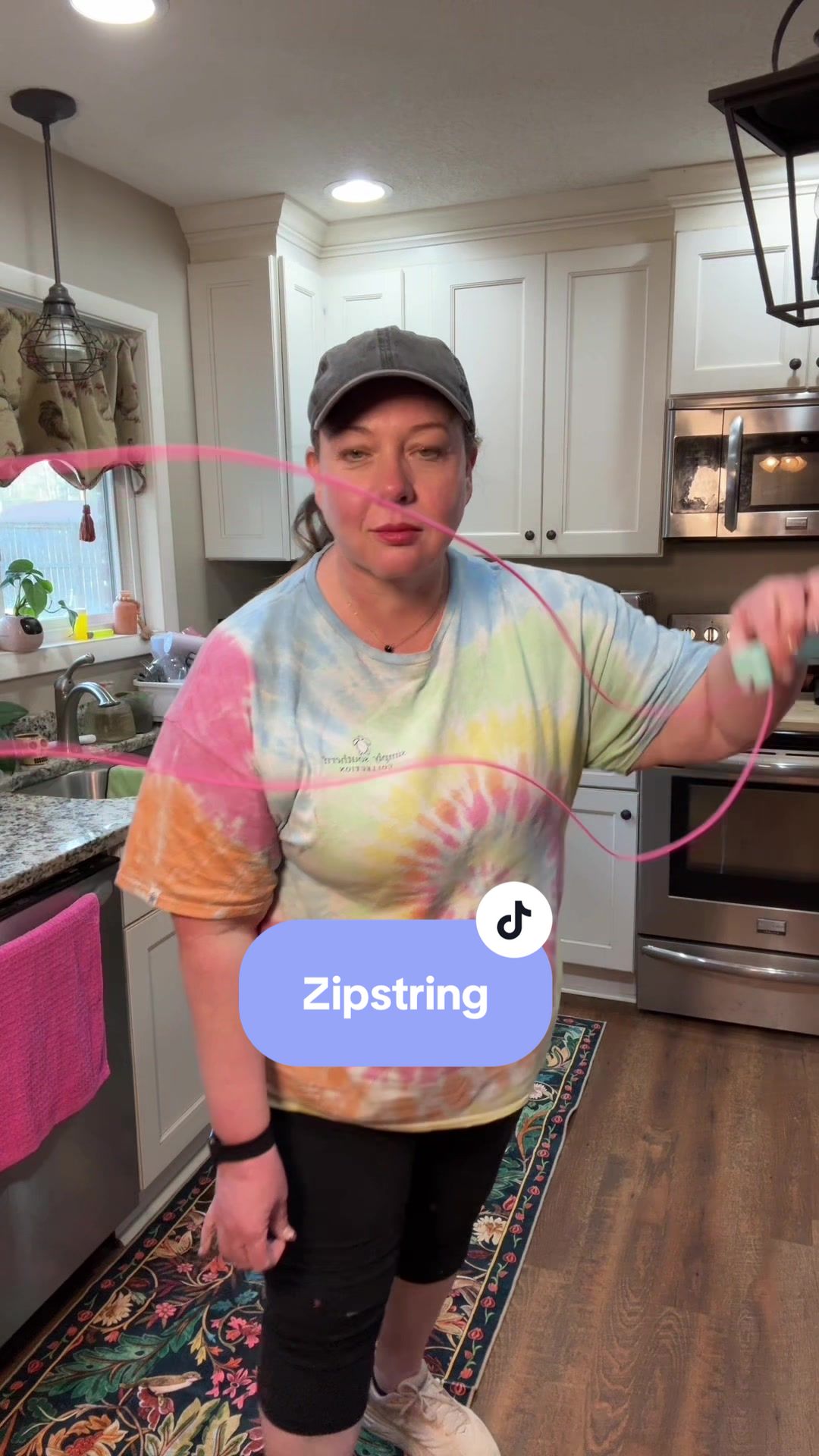 TikTok post by @shoppinwithamy for ZipString. Caption reads: [...] it’s entertaining for everyone. The....