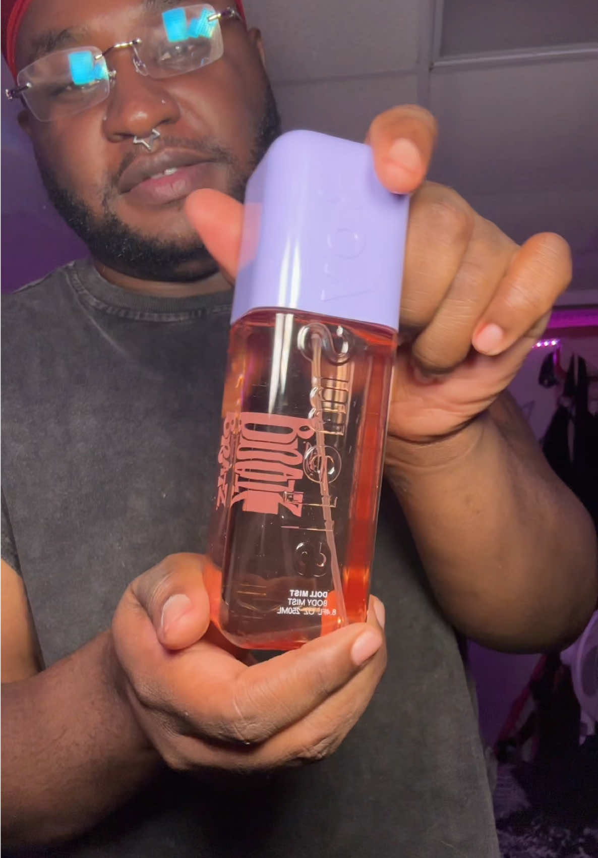 TikTok post by @poorlildarkbxyy for Bratz. Caption reads: [...] me with this 😭 #boysmells #fragrance @bratz.