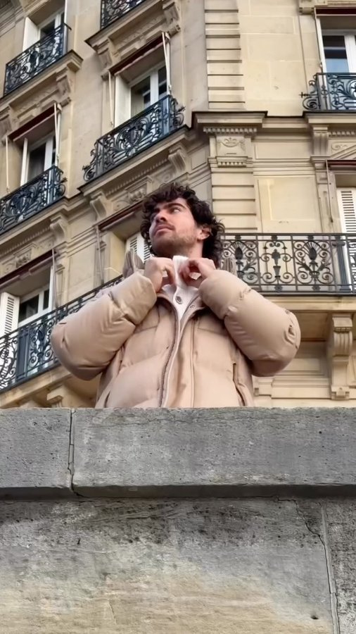 Instagram post by @yanistyli for Herno. Caption reads: [...] it cozy while strolling around Paris....