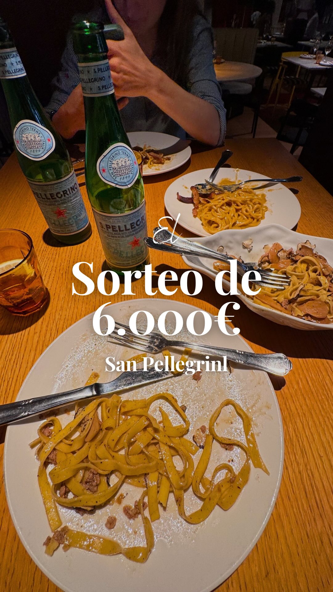 Instagram post by @planesenbarcelona for Sanpellegrino. Caption reads: #publi 🎁 Consigue comer gratis cada día hasta....