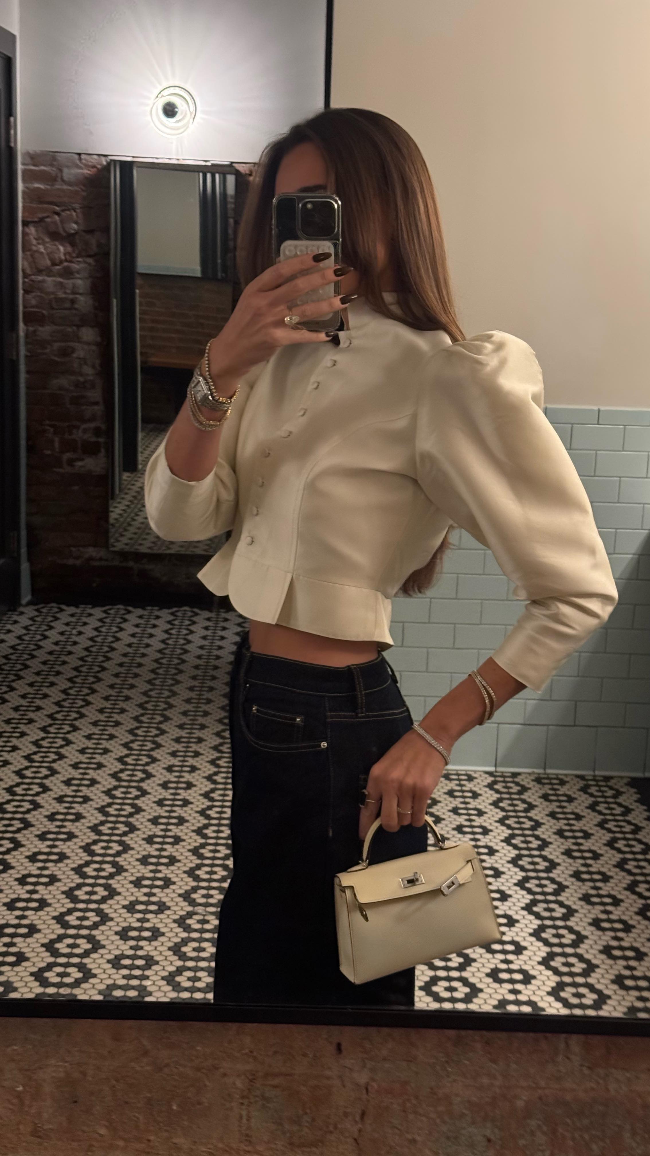 Instagram post by @weworewhat for The Knot. Caption reads: come with me to a bridal fashion week dinner for....