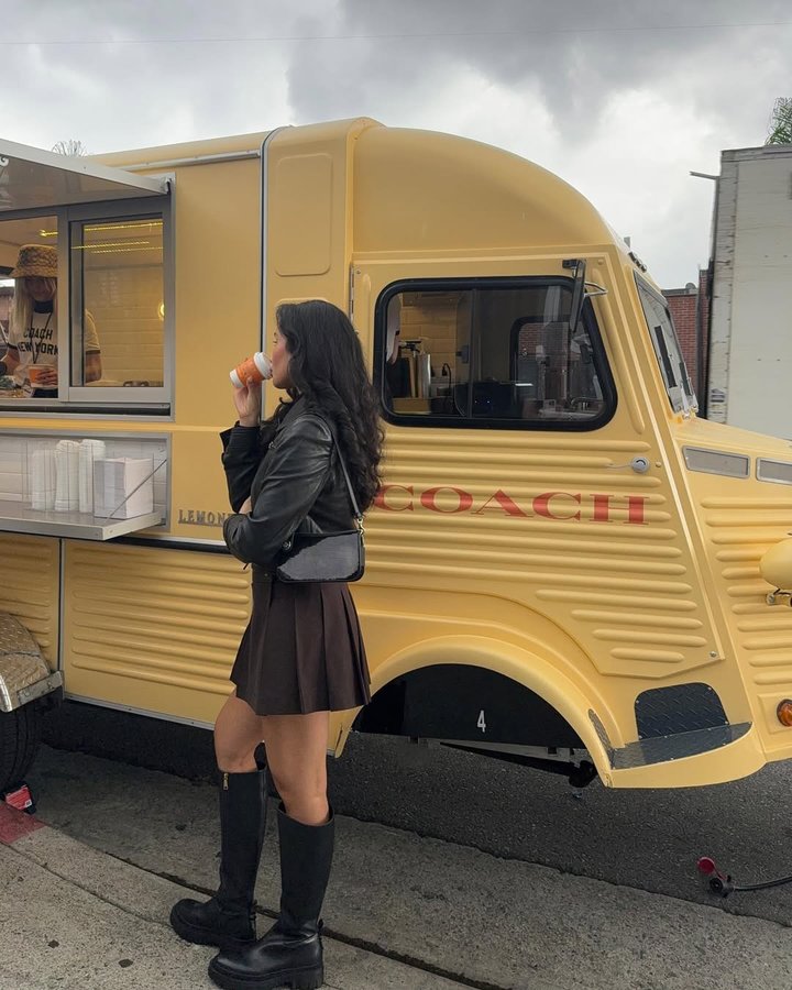 Instagram post by @kristincabat for Teen Vogue. Caption reads: [...] wearing @coach’s Shine Collection at....