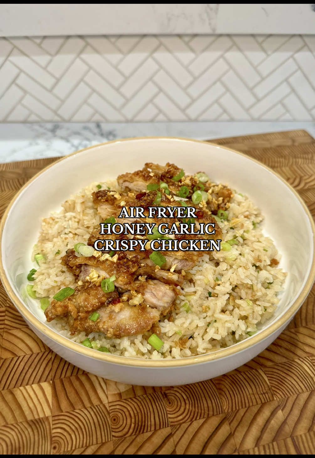 TikTok post by @thespicyjuju for Instant Pot. Caption reads: Air Fryer Honey Garlic Crispy Chicken🍯🧄🍗 Visit....