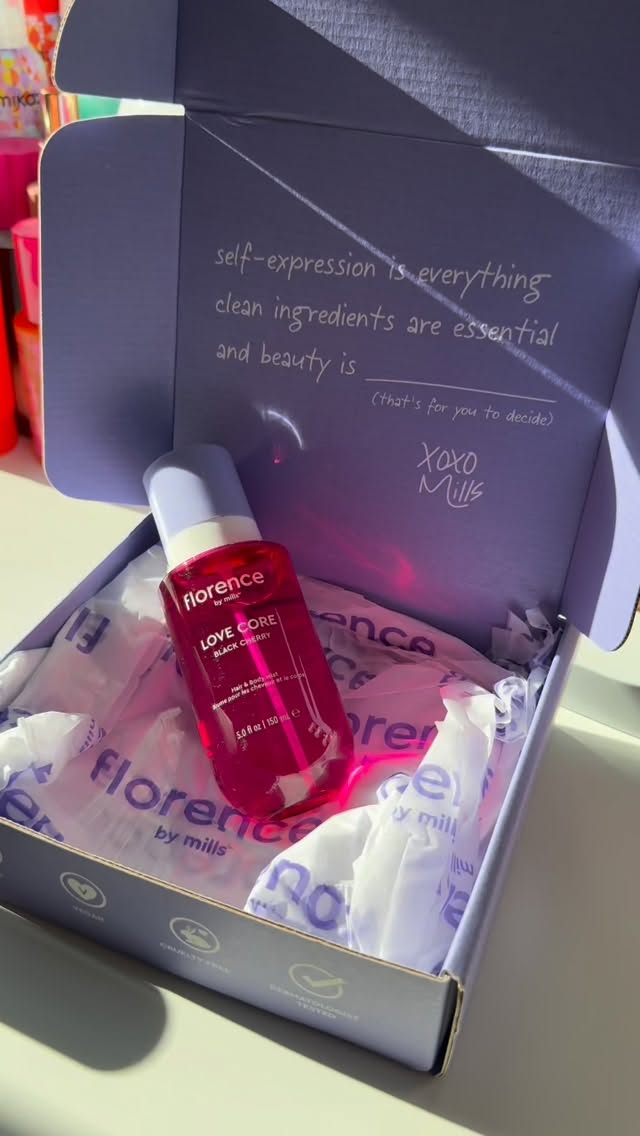 Instagram post by @beautywitharianah for florence by mills. Caption reads: unbox the love core black cherry hair and body....