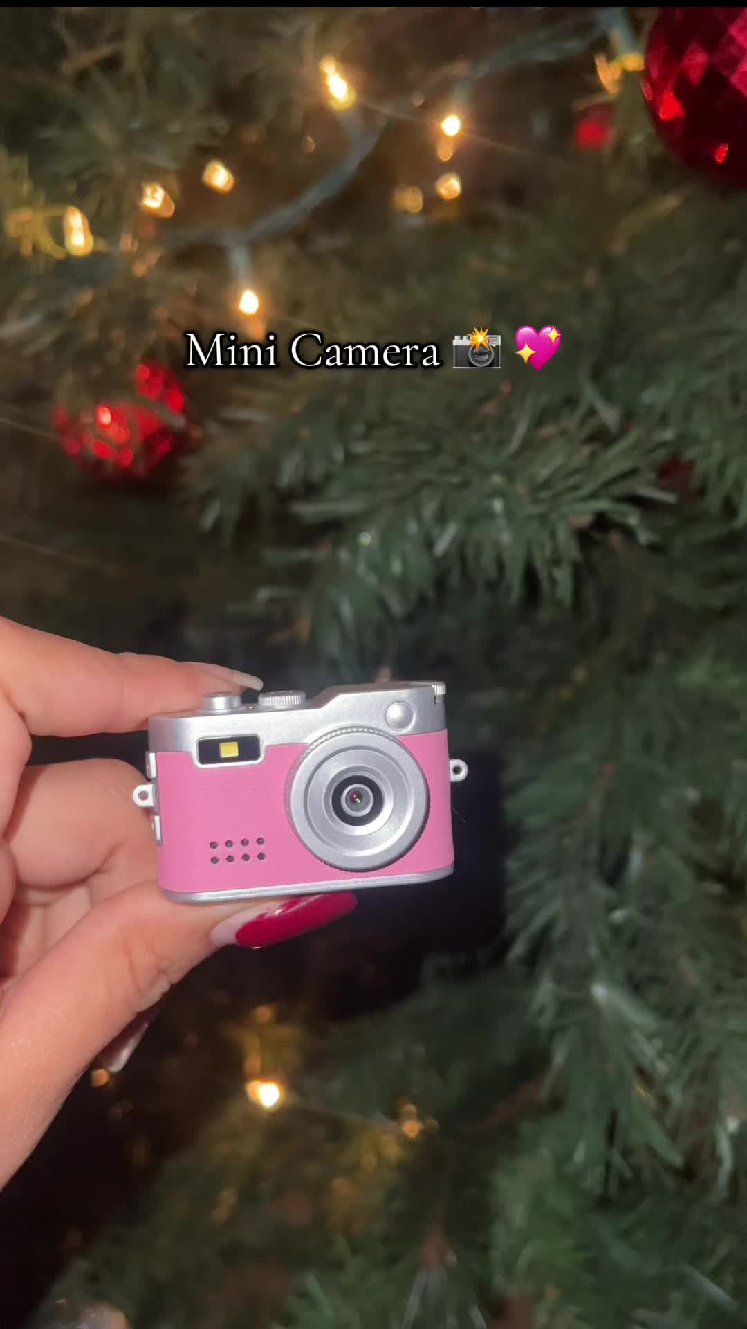 TikTok post by @uh_lesliee for Fitpolo. Caption reads: The cutest keychain camera that you can carry....
