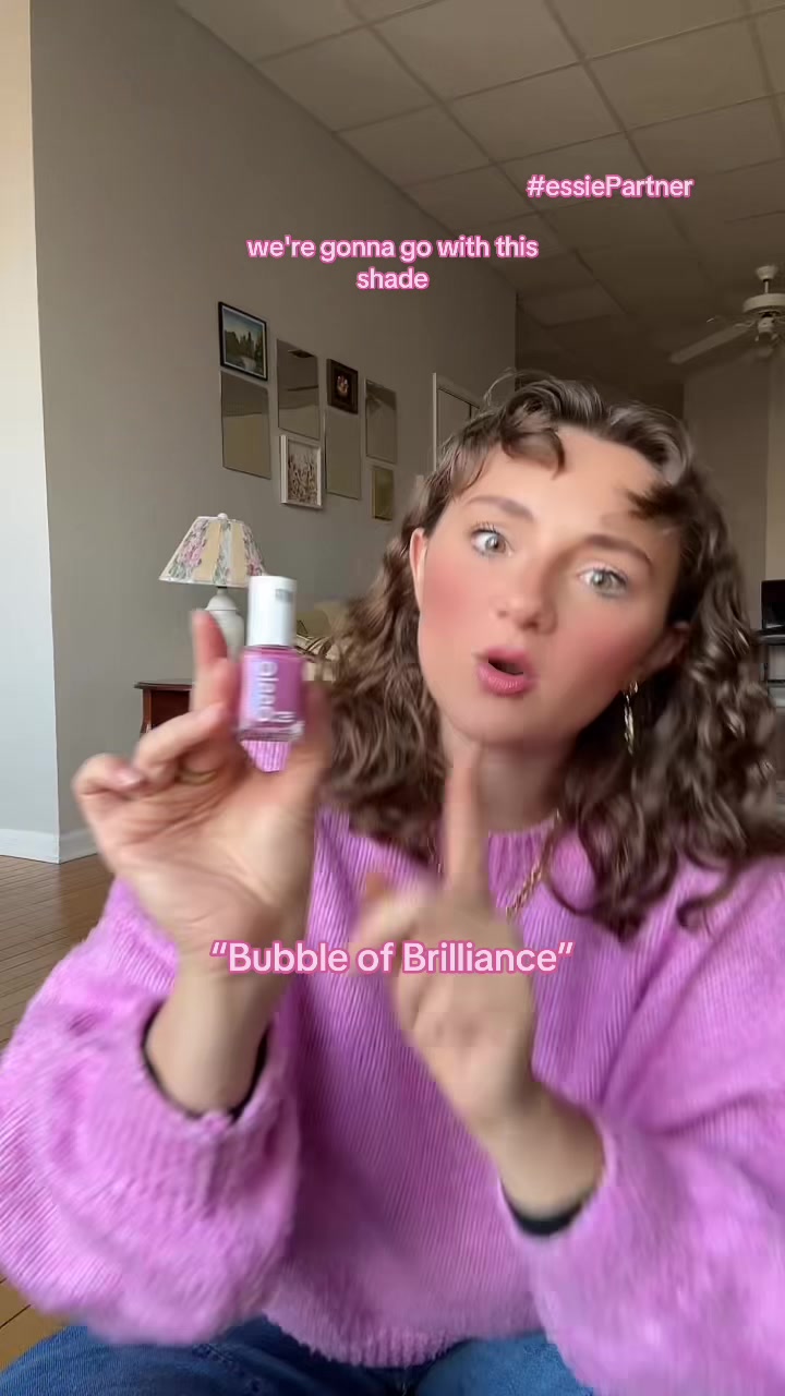 TikTok post by @rachel.ann.thomas for essie. Caption reads: Channeling my inner Glinda 💕🫧 with the new....