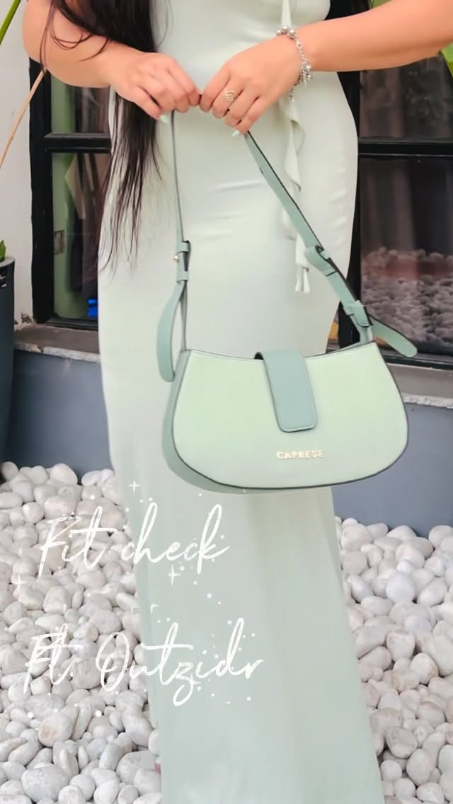 Instagram post by @that_diva_girl28 for OUTZIDR. Caption reads: Obsessed with this 👗 💚 . . . . #outzidr....