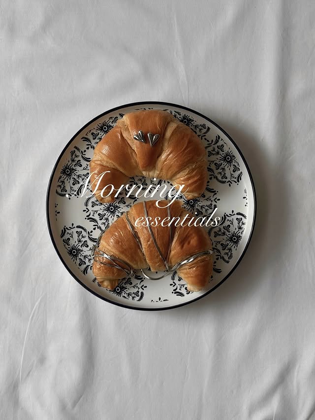 Instagram post by @aggie_style for By Dziubeka. Caption reads: Dzień dobry 🥐 Biżuteria @bydziubeka #biżuteria....