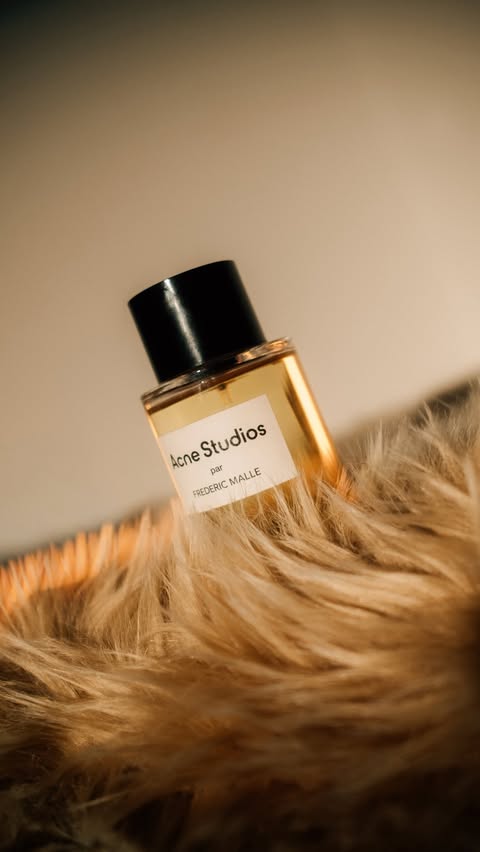 Instagram post by @youngchanmoon for Acne Studios. Caption reads: Welcome to the Frederic Malle x Acne Studios....