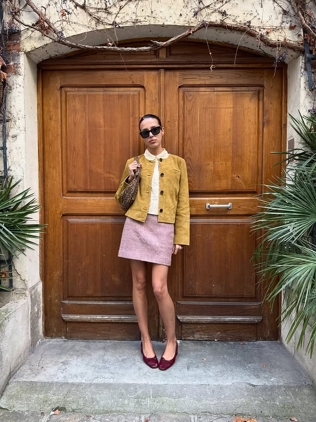 Instagram post by @maina for Rouje. Caption reads: city to gallery kinda day 💋 @rouje....