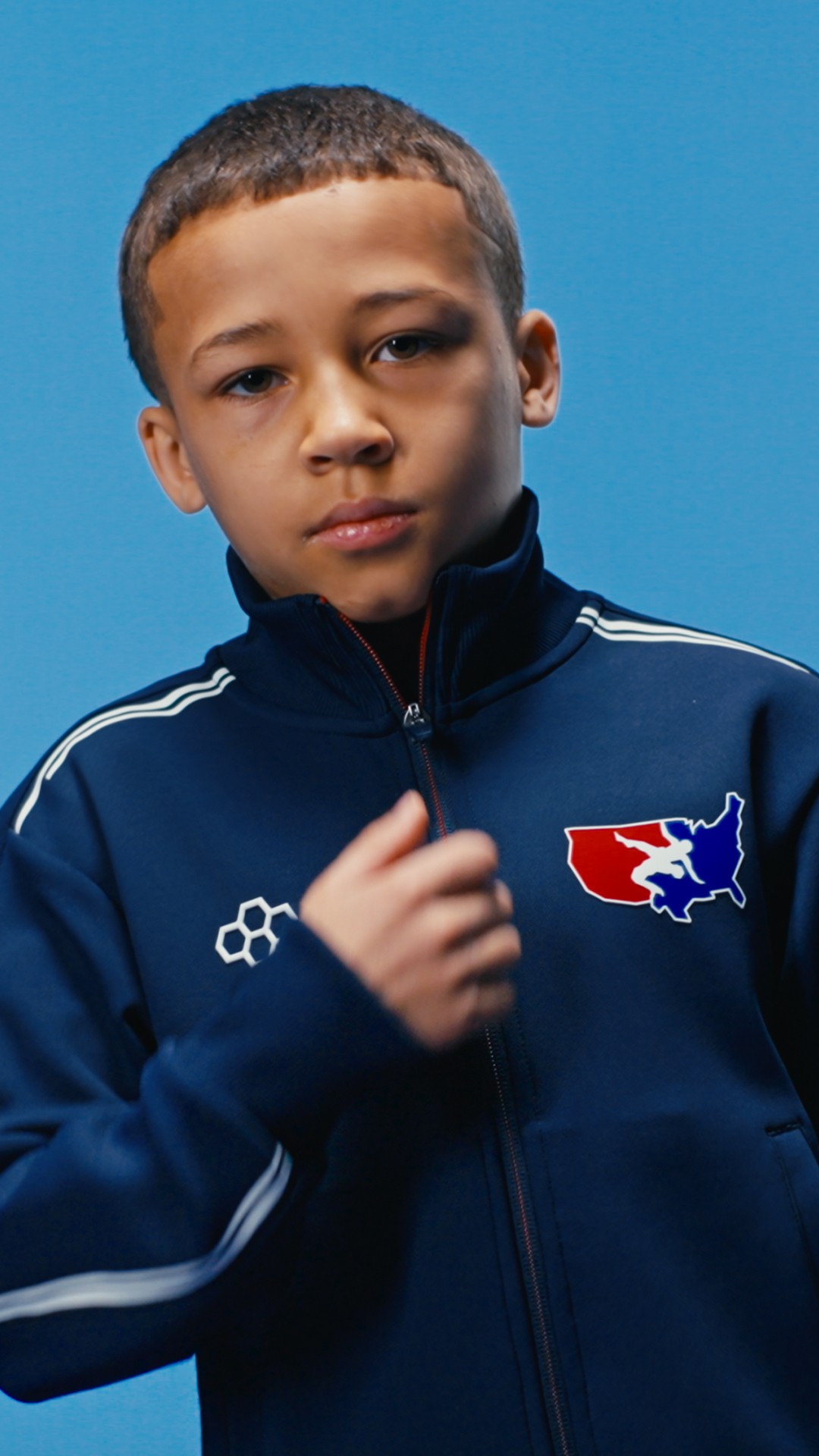 Instagram post by @usawrestling for RUDIS. Caption reads: [...] Driven by Purpose. @USAWrestling x RUDIS....