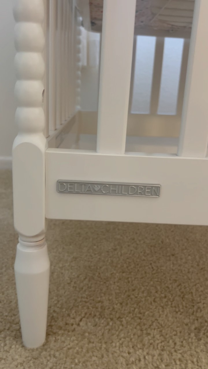 Instagram post by @bluederrr for Delta Children. Caption reads: I found the best crib from @deltachildren 🩷🌺....