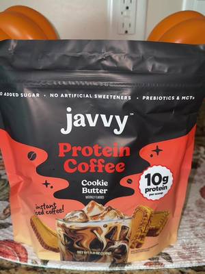 TikTok post by @missladyslc for Javy Coffee. Caption reads: New! Cookie butter flavor, click the cart to....
