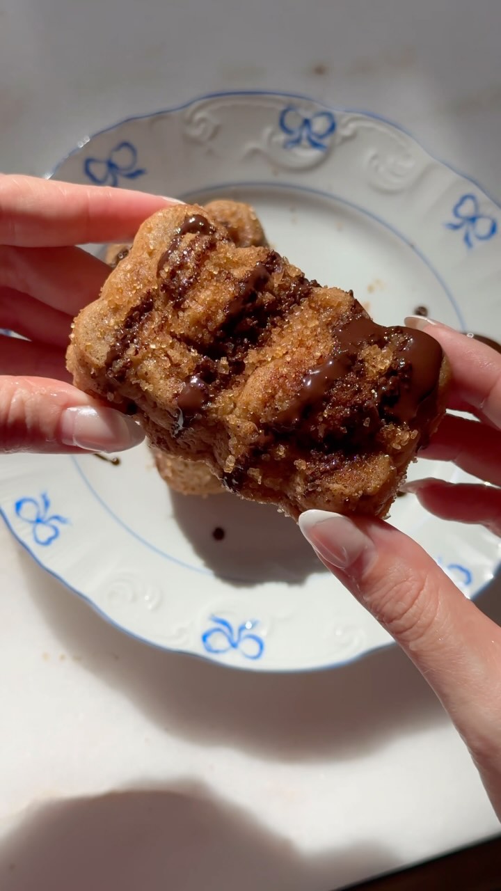 Instagram post by @theplantcollective_ for Hu Kitchen. Caption reads: POV: you found the best way to enjoy chocolate! I....