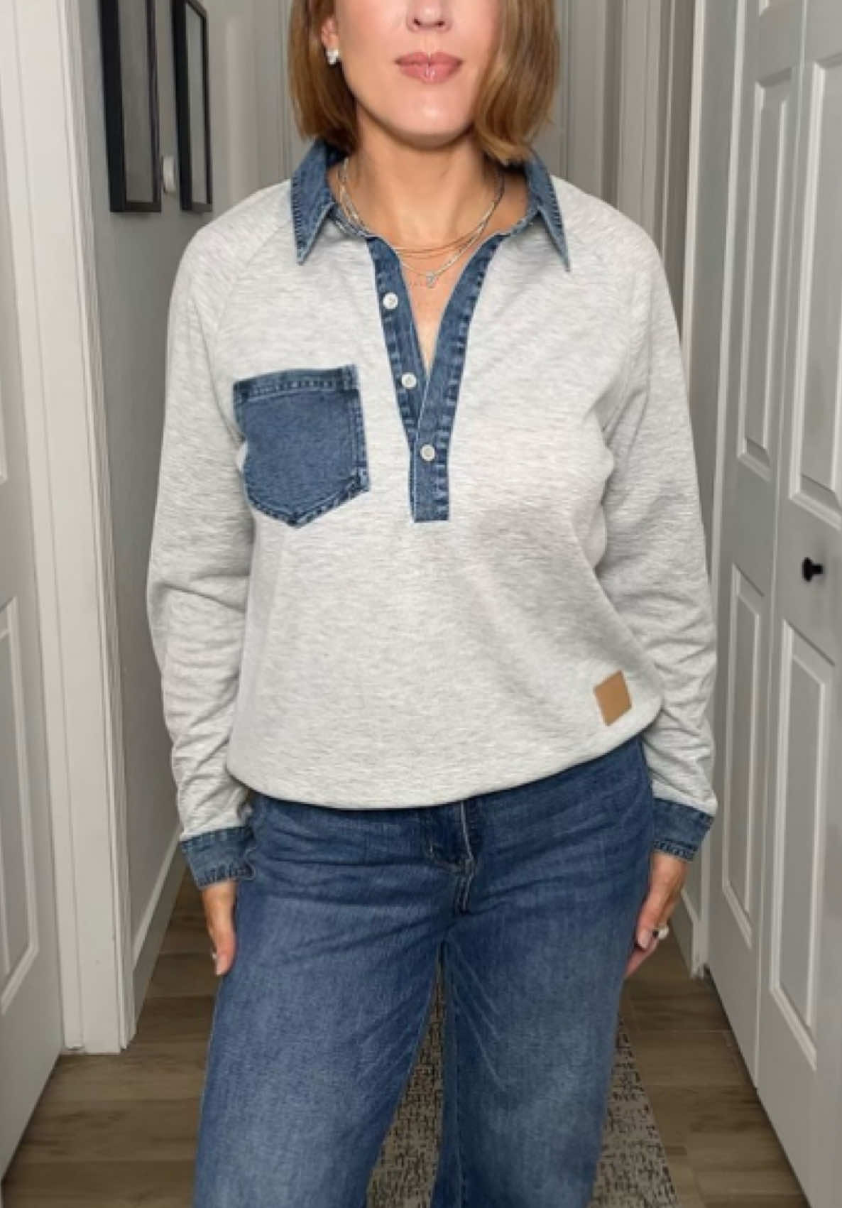 TikTok post by @breezypleazy for Shewin Boutique. Caption reads: Pullover with the cutest denim accents @Asvivid....