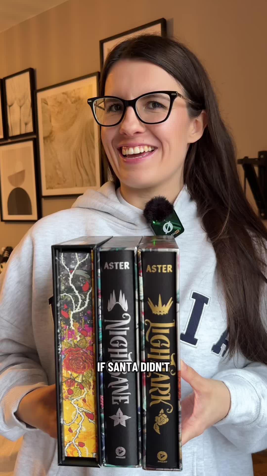 TikTok post by @violet.hollow for Books2Door. Caption reads: [...] with tonnes of unique artwork 😭👏....
