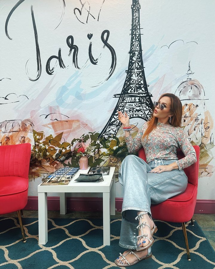 Instagram post by @angela_miller_kumar for JustFab. Caption reads: [...] Pairs Rhinestone Chic Flat Sandals from....