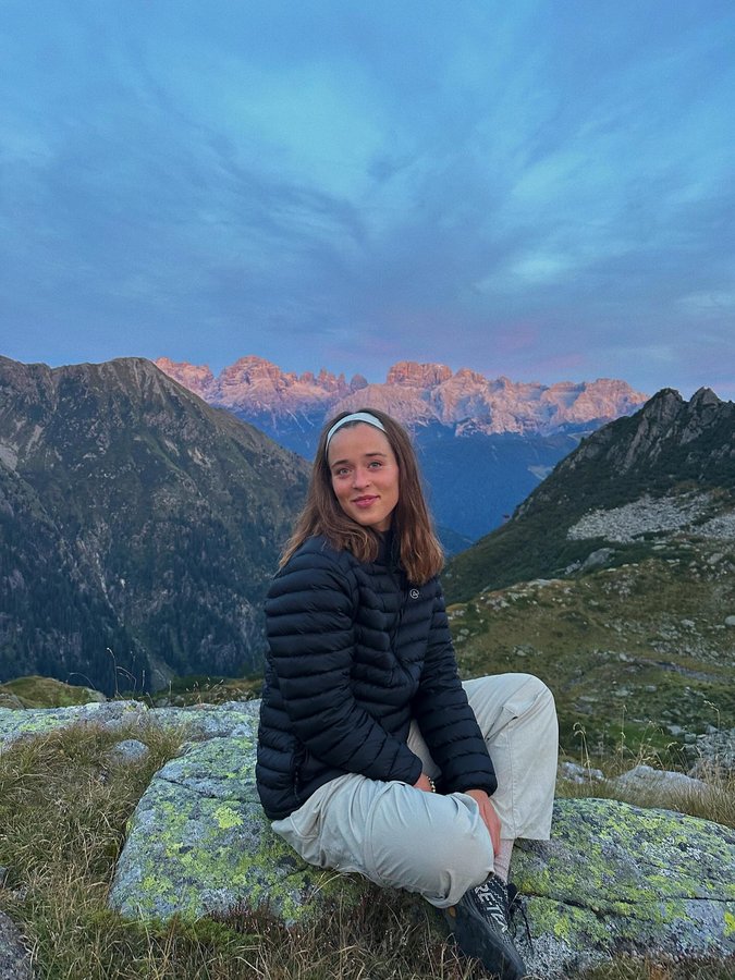 Instagram post by @nadiachrin for Merrell. Caption reads: :) Sat here and watched the sunset colours while....