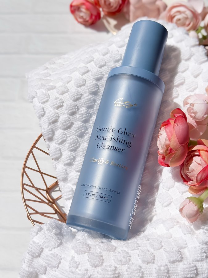 Instagram post by @nine.lives_kat for City Beauty. Caption reads: Gentle Glow with City Beauty! ✨ #citybeautypartner....