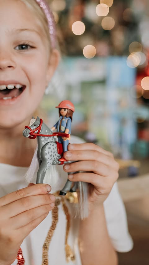 Instagram post by @raising.wildlings_ for PLAYMOBIL. Caption reads: [...] you her new favorite play set from....