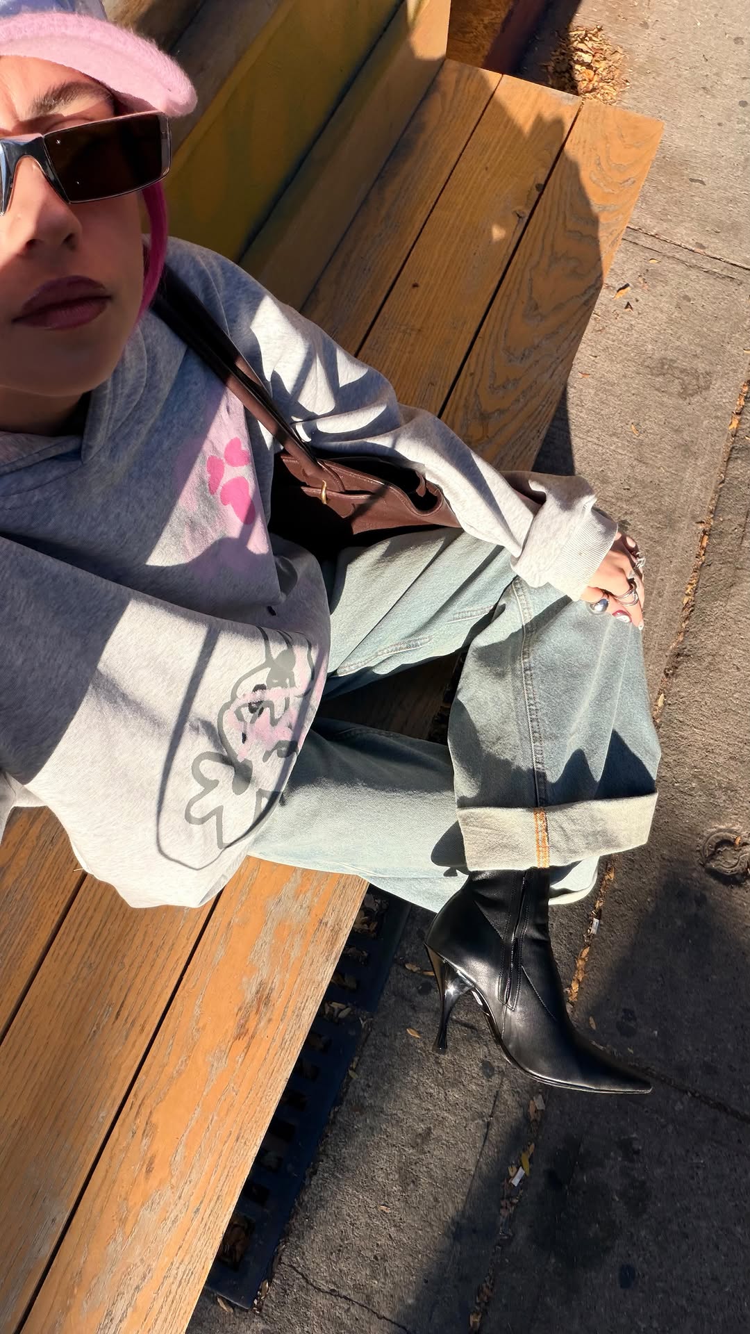 Instagram post by @lizzi.jpg for SexyHair. Caption reads: never know what ur gonna get 🎰 #bangs.