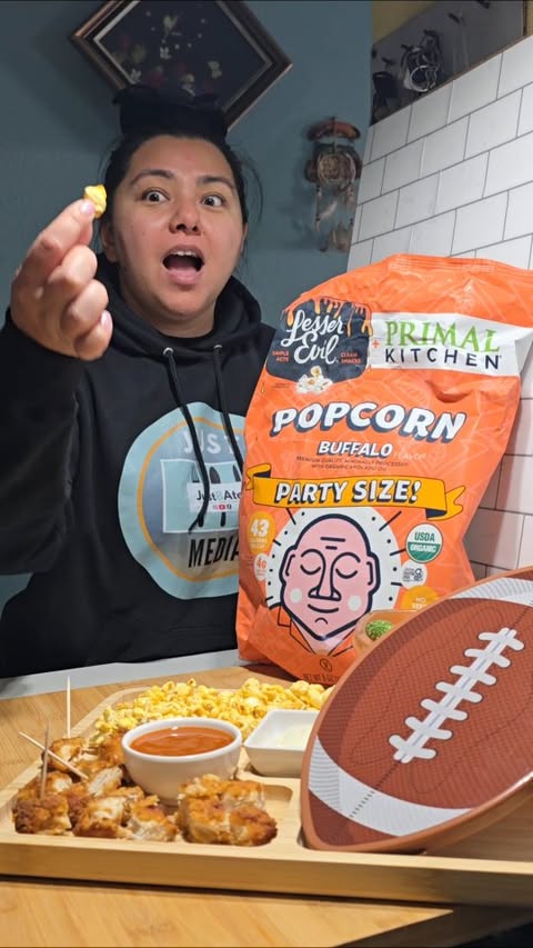 Instagram post by @judyannmi for LesserEvil. Caption reads: [...] you take a bite of this Buffalo style....