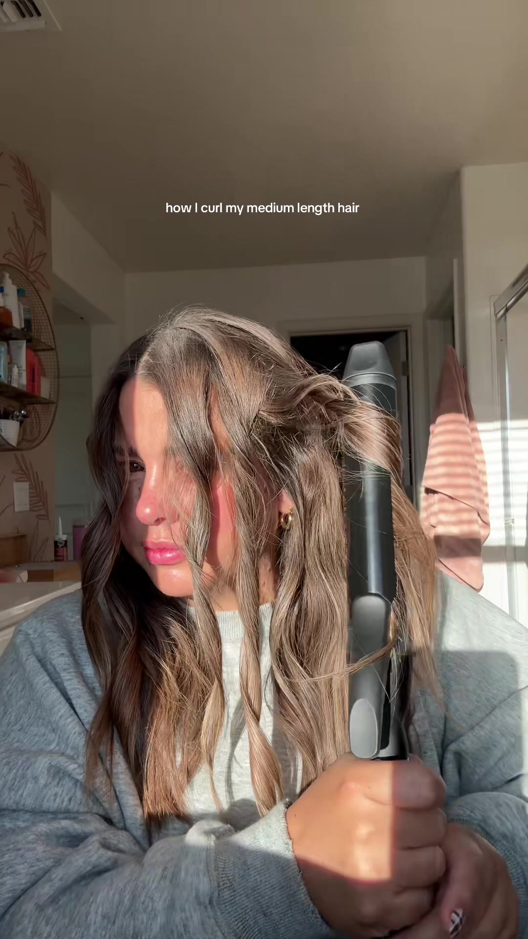 TikTok post by @haleyharrison__ for NAVY Hair Care. Caption reads: [...] bio ionic curling iron! @Bio Ionic....