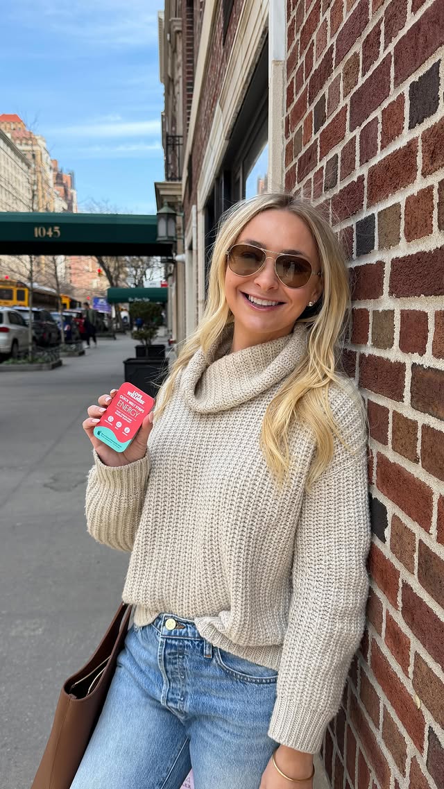 Instagram post by @onelitmama_ for Love Wellness. Caption reads: [...] get energy on-the-go with @lovewellness....