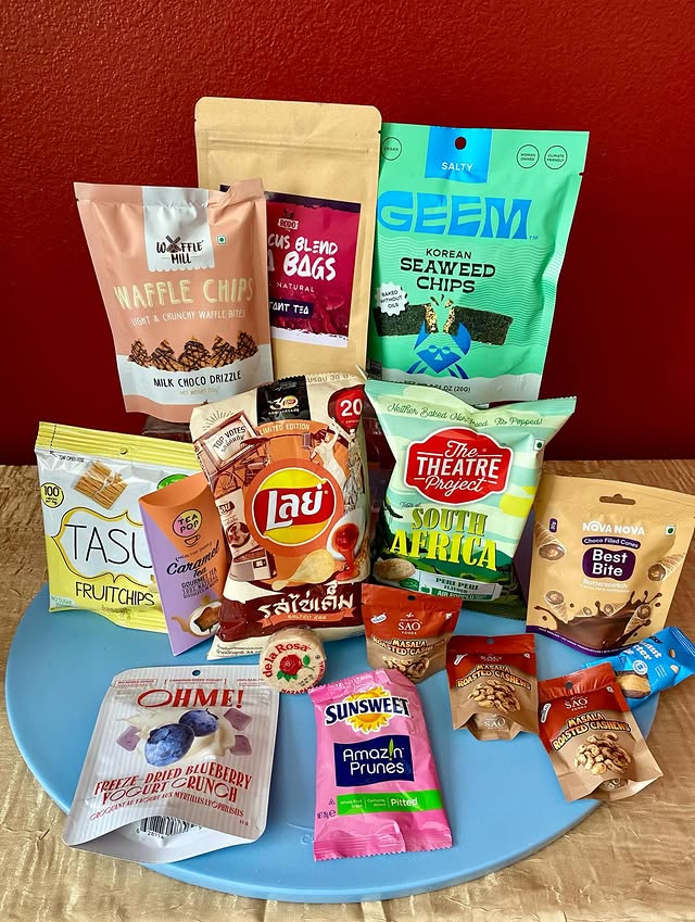 Instagram post by @desertfoodie88 for Try The World. Caption reads: #ad Thank you @trytheworld for this fun snack box....