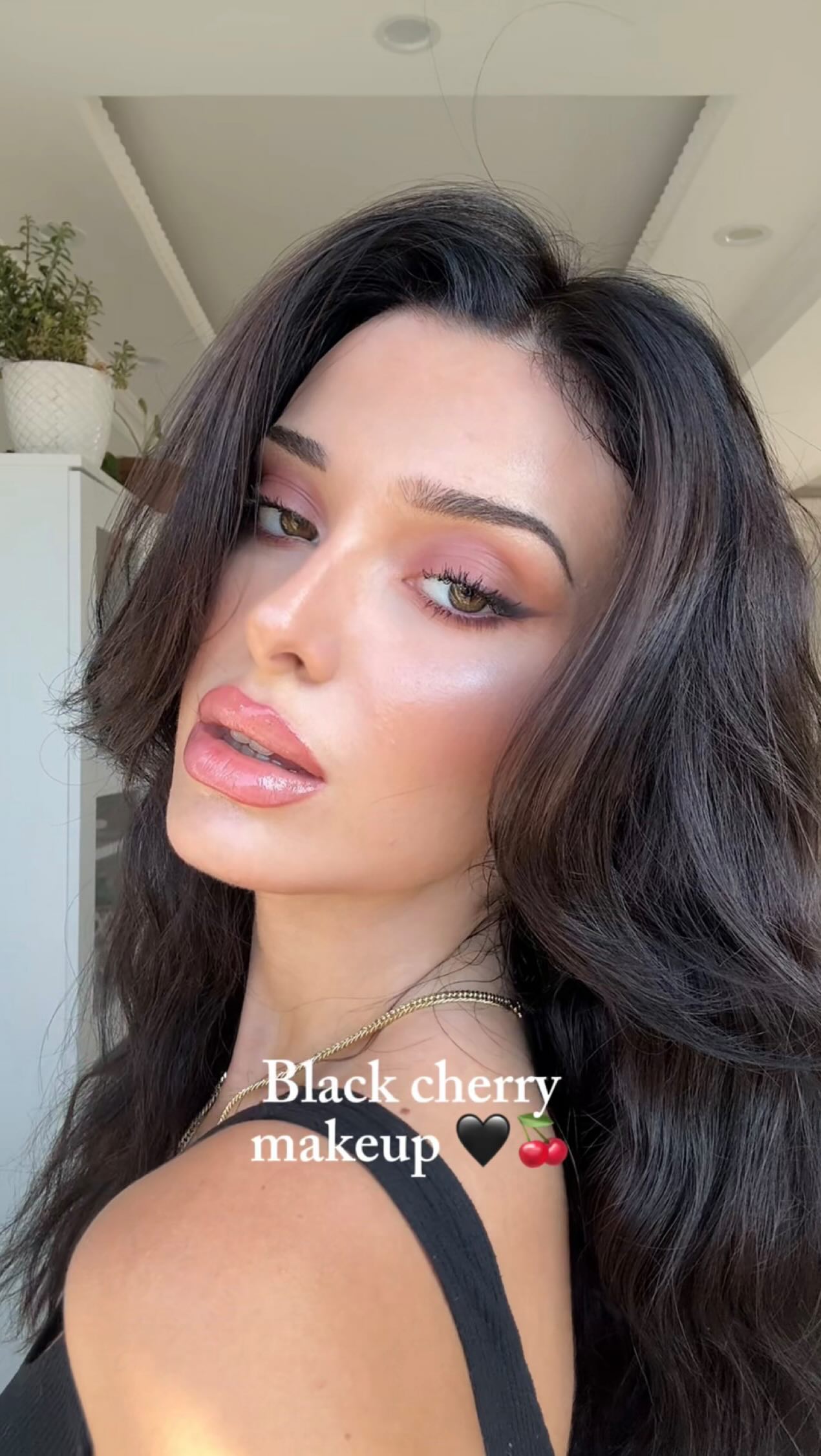 Instagram post by @laytugce for Armani beauty. Caption reads: Meğer black cherry benim makyajımmış🖤🍒 Ben çok....