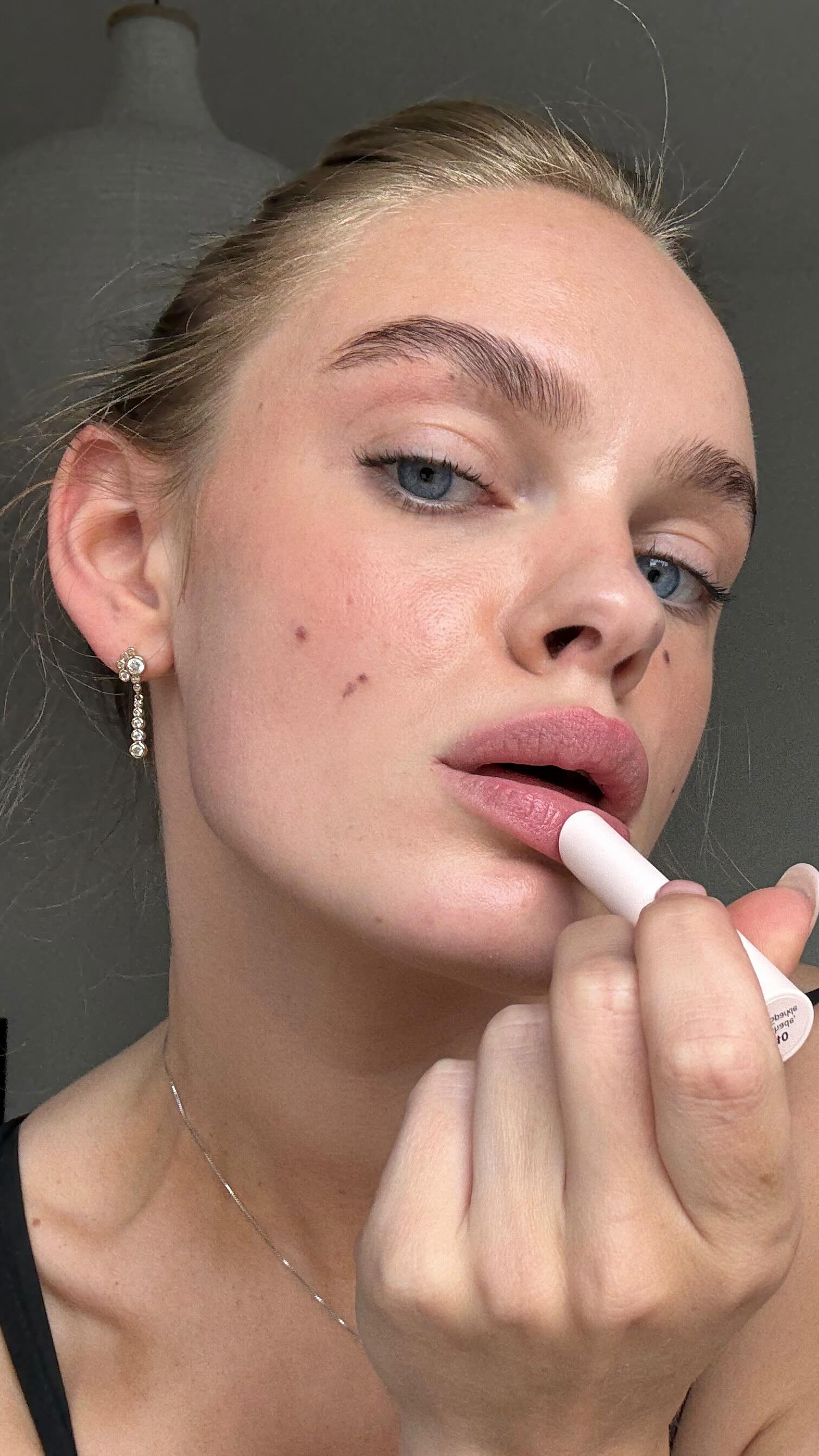 Instagram post by @julemariep for CATRICE Germany. Caption reads: anzeige | meine drogerie essentials von....