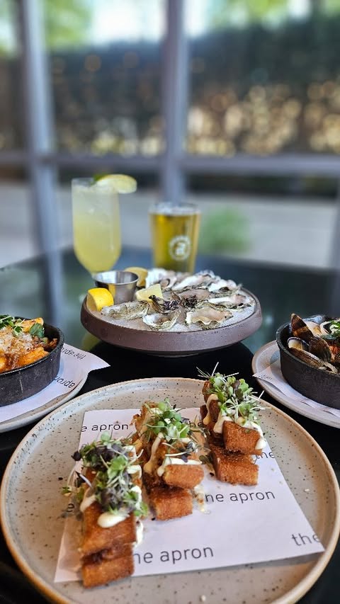 Instagram post by @miy0283 for Canadians Connect. Caption reads: NEW HAPPY HOUR EATS ⭐️@apronyvr is located in the....