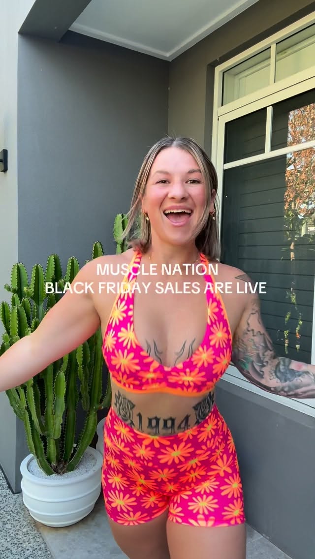 Instagram post by @_elliewilsonfitness__ for Muscle Nation. Caption reads: HELLOOO… WHY ARENT YOU SHOPPING 🎉 @musclenation....