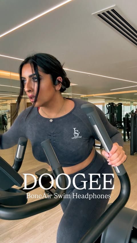 Instagram post by @saimasalmafit for DOOGEE. Caption reads: [...] 🎧💦✨ From workout mode to poolside, the....